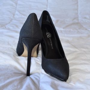 Black stiletto pumps